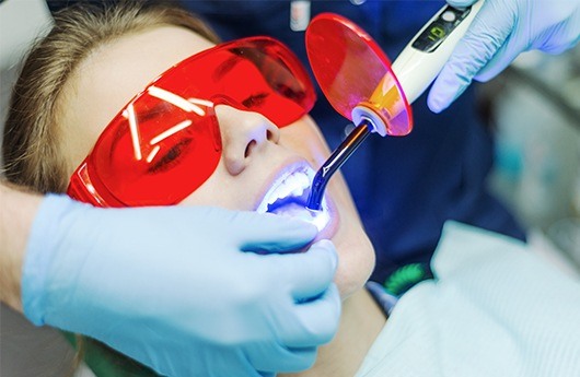 Woman receiving dental bonding treatment