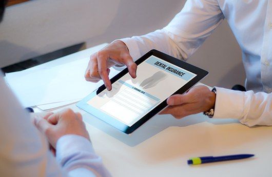 Dental insurance forms on tablet computer