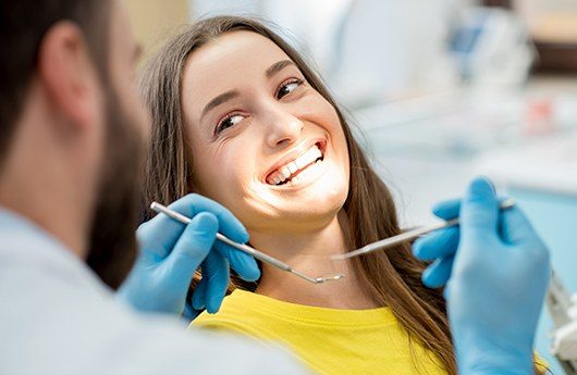 Woman receiving dental checkup