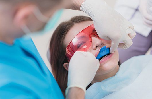 Patient receiving fluoride treatment