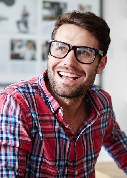 Man smiling after T M J treatment