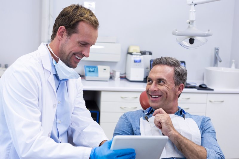 Man smiling at dentist